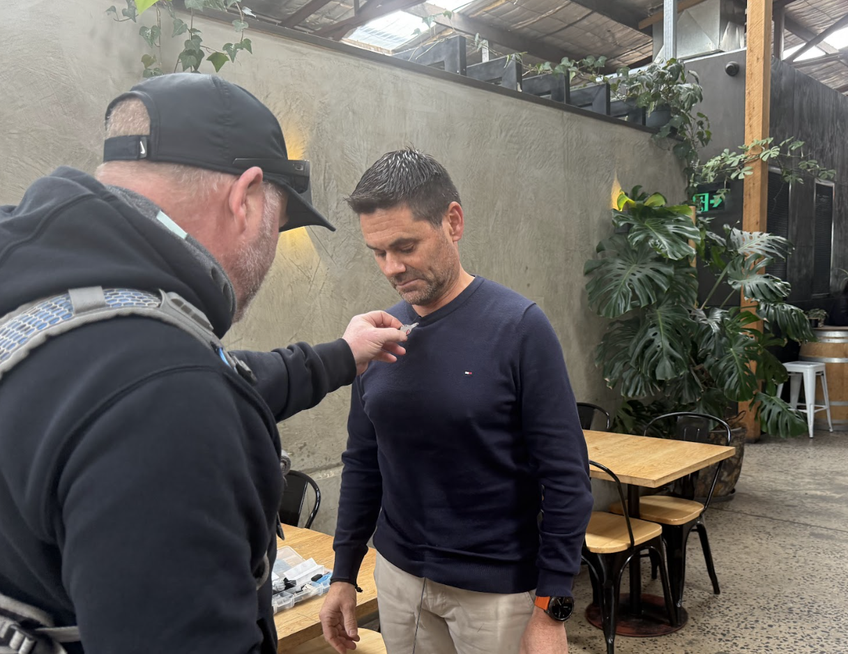 Team Effort: Mic test! Sound checks and mic adjustments ensured every word would be captured clearly.