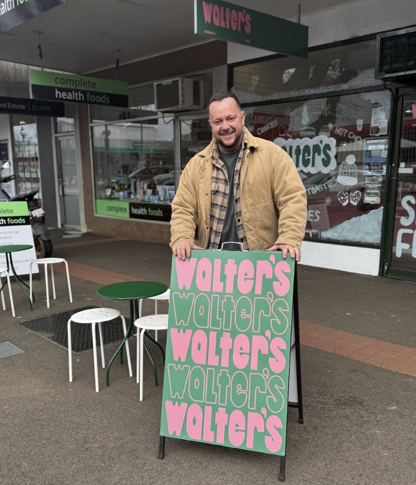 On Location: A cosy café in the heart of town, complete with classic signage and a friendly local vibe.